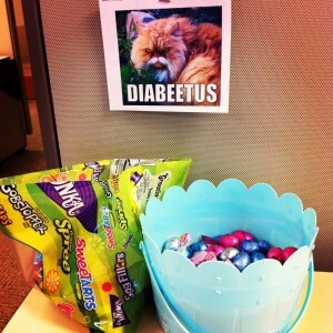 The scene at my desk earlier this week. Diabeetus cat wants you to have some Easter candy.